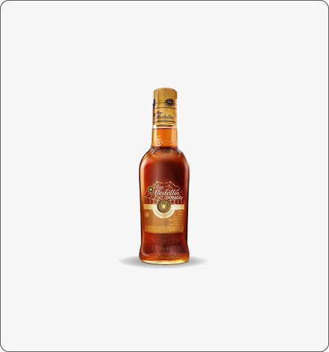 https://barsalicoresla18.com/wp-content/uploads/2022/10/Ron-medellin-dorado-375ml.png
